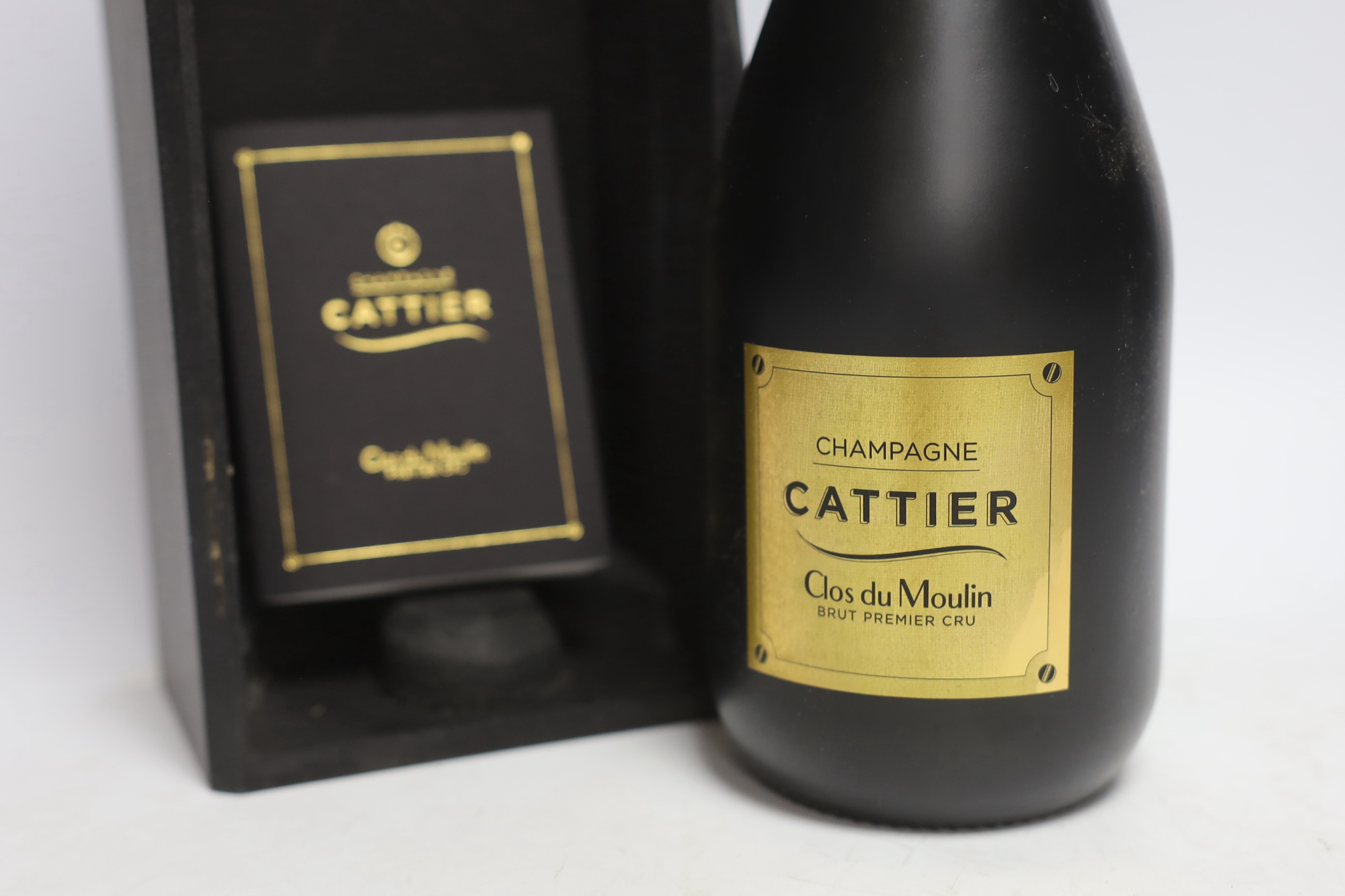 A bottle of Cattier Clos du Moulin champagne, boxed (lid missing)